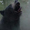 Two hikers encounter the Cocaine Bear in a clip from the new film