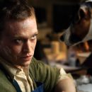 Watch Caleb Landry Jones in the trailer for Luc Besson’s Dogman